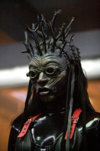 Read more about the article Hostel III (2011) – Halloween Special – Armbreast, Mask and Latex